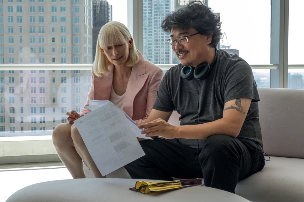 Tilda Swinton and Bong Joon-ho on the set of "Okja."