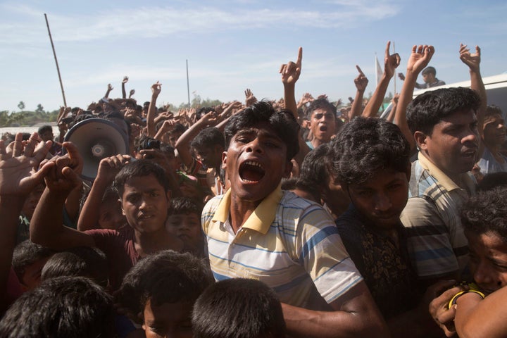 Rohingya refugees shout slogans during a protest against the repatriation process at Unchiprang refugee camp near Cox's Bazar, in Bangladesh on 15 November, 2018.