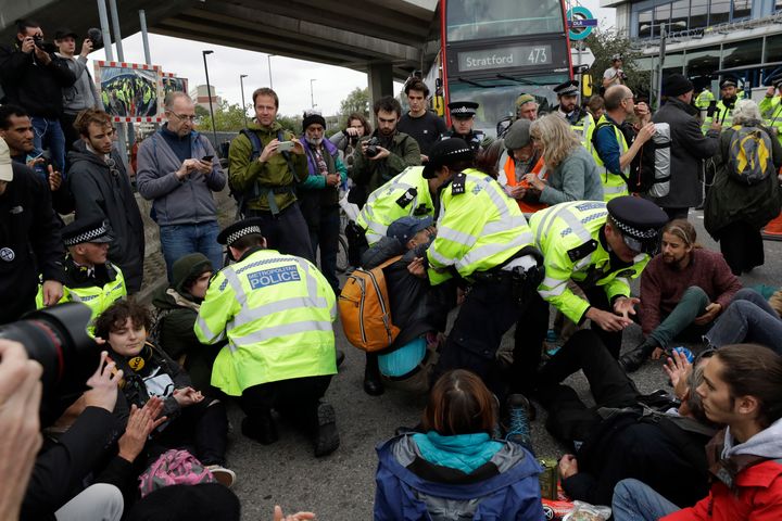 XR climate change protesters block a road outside City Airport in London, October 10