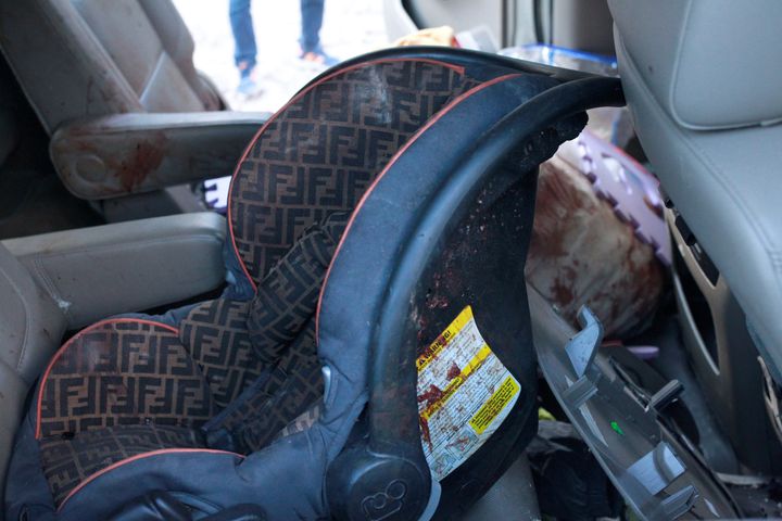A car seat stained in blood is pictured in a bullet-riddled vehicle belonging to one of the Mexican-American Mormon families that were killed by unknown assailants, in Bavispe, Sonora state, Mexico, Nov. 5, 2019.