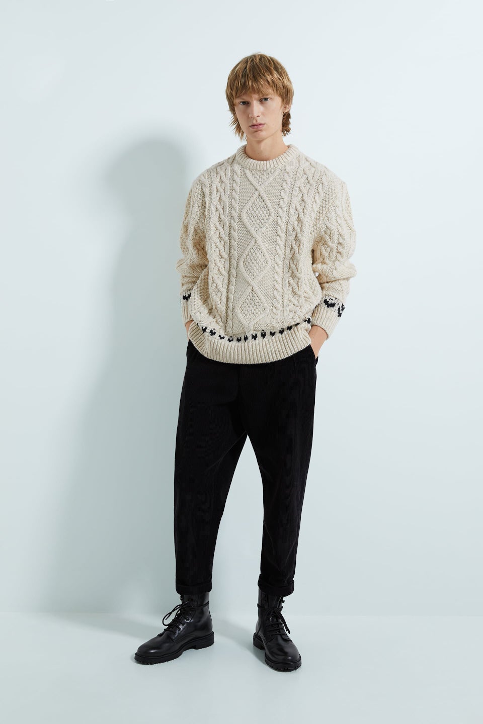 Cable-knit sweater with contrasting trim