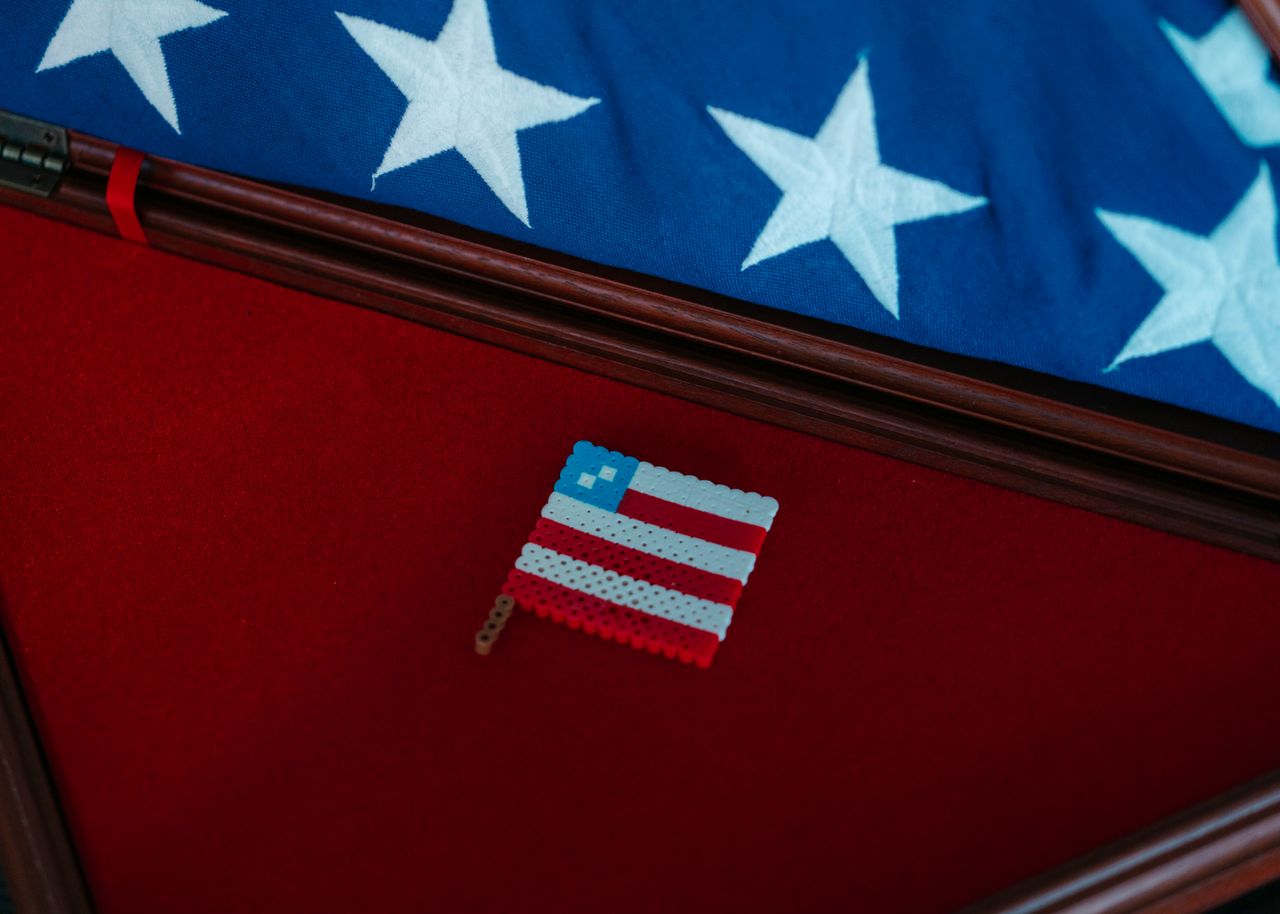 A flag figurine made by Marine 1st Lt. Matthew Davis step-daughter Aubrey Jones placed near his burial flag. 