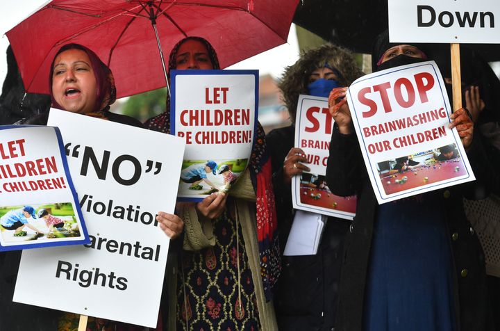 Protestors outside Anderton Park Primary School, in Moseley, Birmingham, demonstrate over LGBT relationship education materials being used at the school