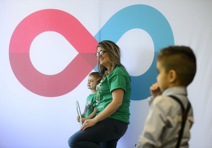 Sylvia Pearson poses for a photo with her son Liam who is a recipient of a double lung transplant during an event for Green Shirt Day and National Organ and Tissue Donation Awareness Week in Ottawa on Wednesday, April 3, 2019. 