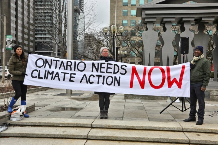 Protesters at a rally to stop climate change outside a Toronto courthouse, April 15, 2019. The Ontario government was challenging the federal government's carbon tax.