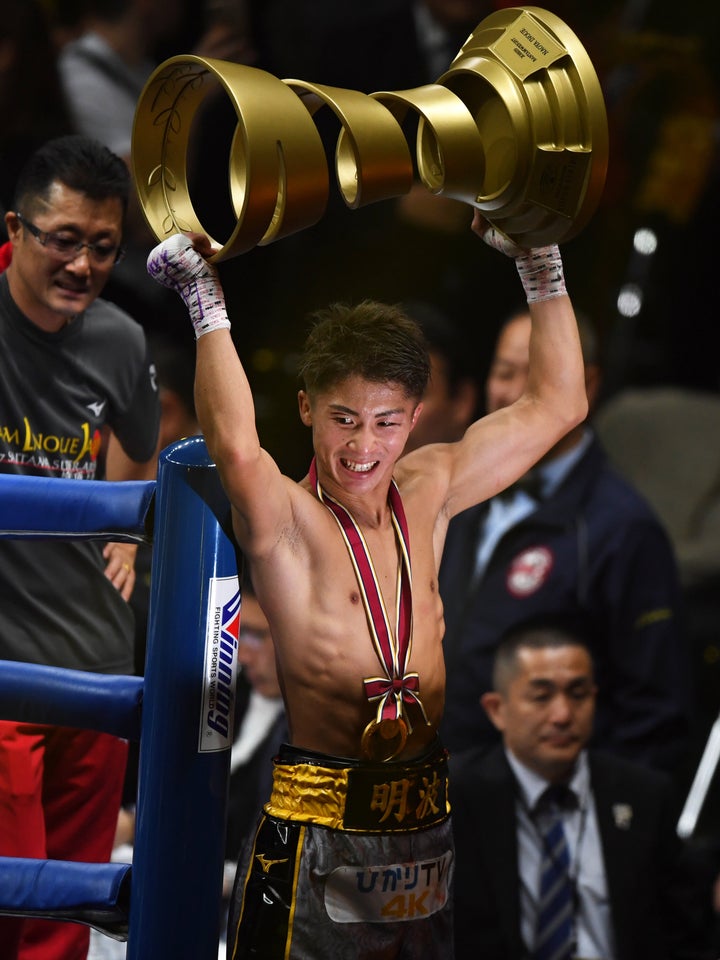 SAITAMA, JAPAN - NOVEMBER 07: Naoya Inoue of Japan celebrates his victory by lifting the Muhammad Ali Trophy after the WBSS Bantamweight Final at Saitama Super Arena on November 07, 2019 in Saitama, Japan. (Photo by Etsuo Hara/Getty Images)