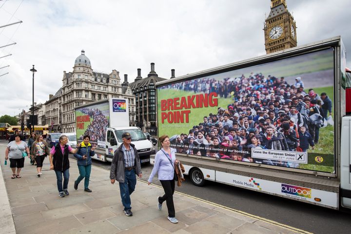 Vans displaying the UK Independence Party's new EU referendum campaign poster near Parliament in June 2016.