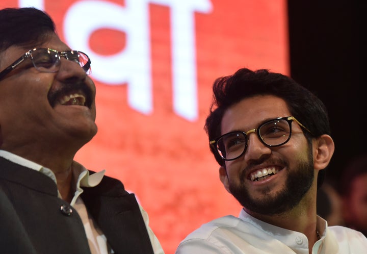 MUMBAI, INDIA - SEPTEMBER 30: Yuva Sena President Aaditya Thackeray and Shiv Sena leader Sanjay Raut share a light moment during a party rally at Worli, on September 30, 2019 in Mumbai, India. While addressing the rally Thackeray announced that he will take the electoral plunge in the upcoming Assembly elections and contest from the Worli constituency in Mumbai. (Photo by Kunal Patil/Hindustan Times via Getty Images)