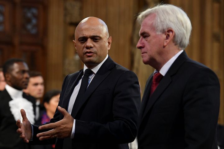 Chancellor of the Exchequer Sajid Javid talks with the Labour Party's shadow chancellor John McDonnell.