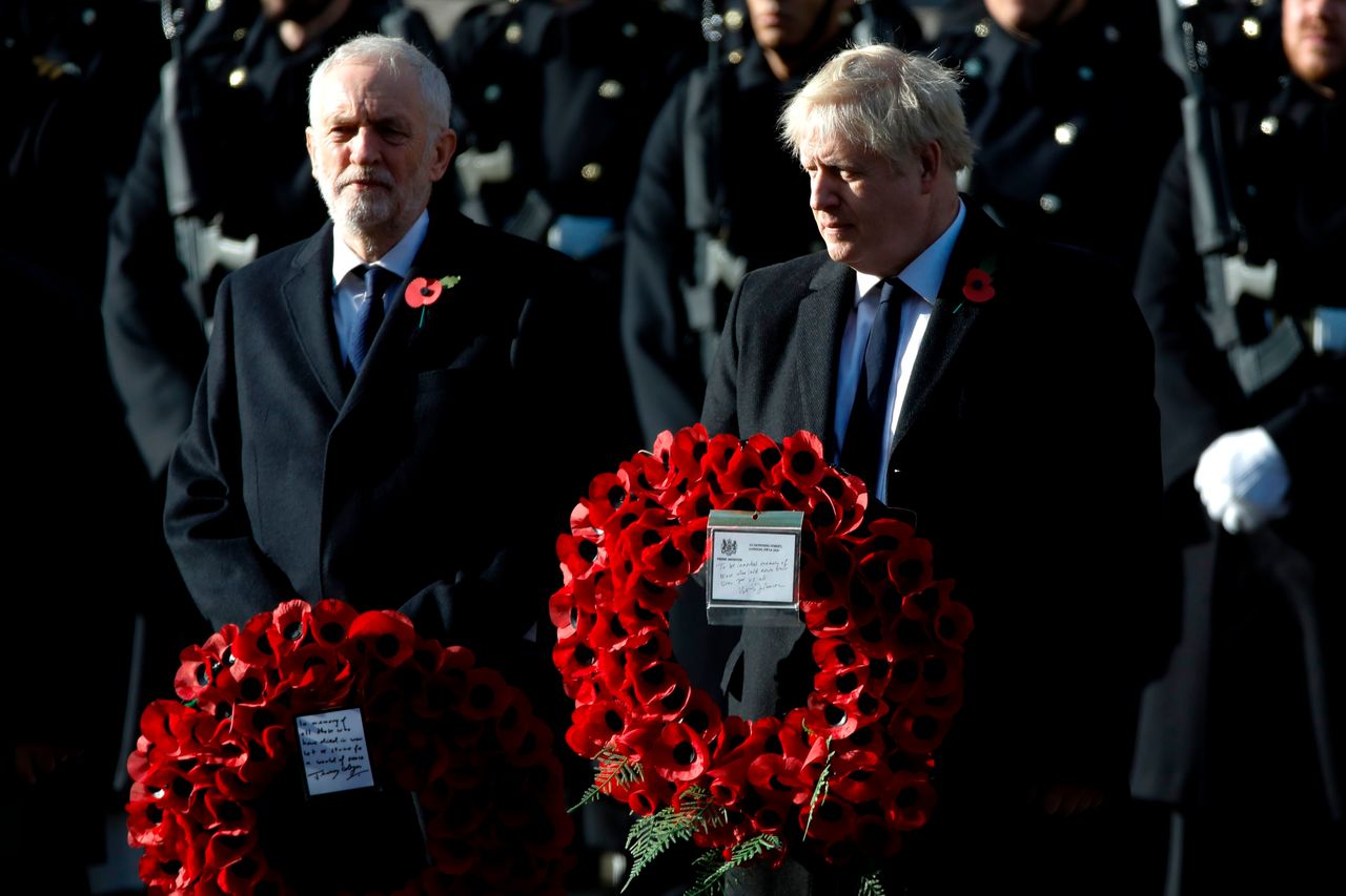 Boris Johnson and Jeremy Corbyn prepare to lay wreaths as they take part in the Remembrance Sunday ceremony at the Cenotaph.