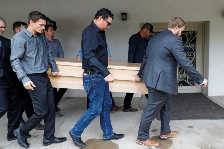 Relatives of Christina Marie Langford Johnson, who was killed by unknown assailants, carry her coffin during the funeral service before a burial at the cemetery in LeBaron, Chihuahua, Mexico November 9, 2019. REUTERS/Carlos Jasso