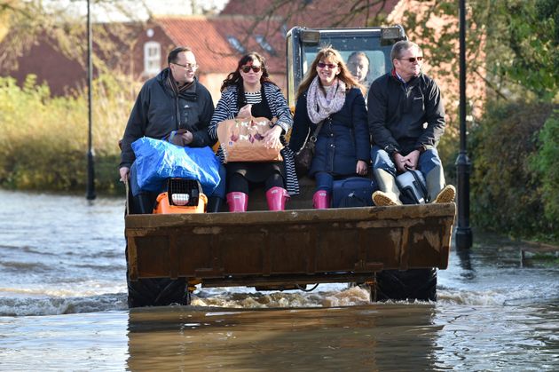 Flood-Hit Villagers Urged To Leave Homes As More Rain Forecast