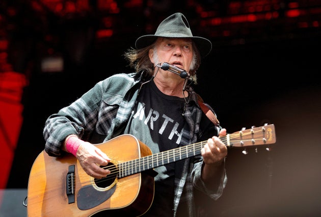 Neil Young performs at the Roskilde Festival in Denmark, on July 1,
