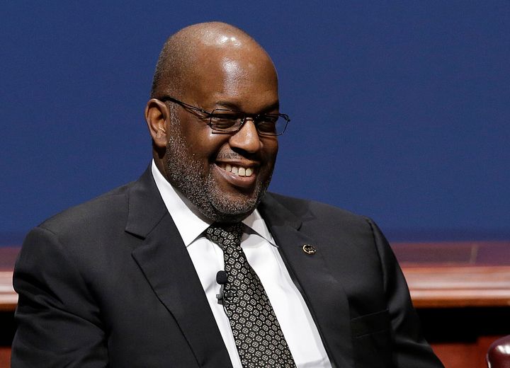 In this Friday, Feb. 13, 2015, file photo, Bernard Tyson, chairman and CEO of Kaiser Permanente, smiles while sitting on a pa