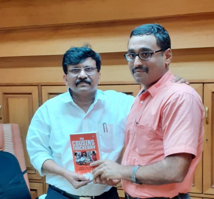 Writer Dhaval Kulkarni with Shiv Sena leader Sanjay Raut