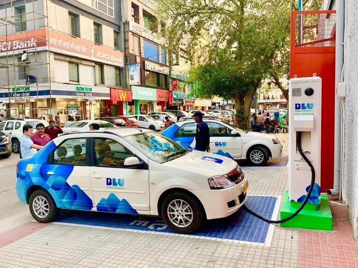 A Blu Smart Mahindra e-Verito, at a charging hub.