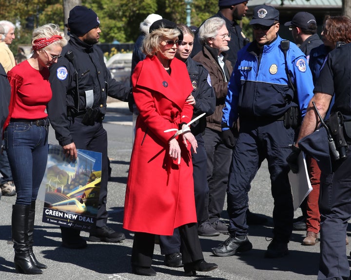 Jane Fonda is arrested for blocking a street in front of the U.S. Capitol during a “Fire Drill Fridays” climate change protest and rally on Oct. 18 in Washington, D.C.