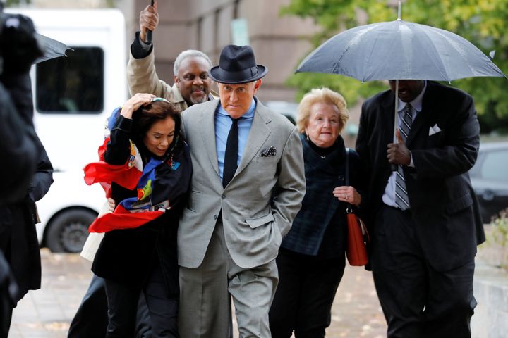 Roger Stone, former campaign adviser to Donald Trump, arrives with his wife, Nydia, at U.S. district court in Washington for the continuation of his criminal trial on charges of lying to Congress, obstructing justice and witness tampering.