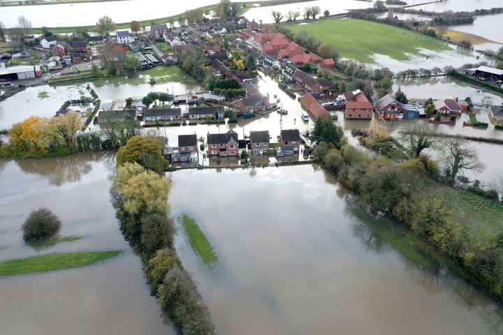 An aerial view of the flood water as parts of England endured a month's worth of rain in 24 hours, in Fishlake, South Yorkshire, England, Monday, Nov. 11, 2019. Scores of people were rescued or forced to evacuate their homes. (Richard McCarthy/PA via AP)