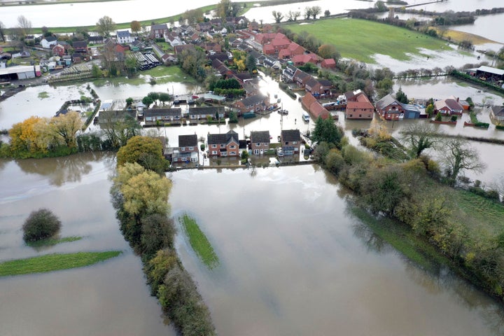 An aerial view of the flood water as parts of England endured a month's worth of rain in 24 hours, in Fishlake, South Yorkshire, England, Monday, Nov. 11, 2019. Scores of people were rescued or forced to evacuate their homes. (Richard McCarthy/PA via AP)