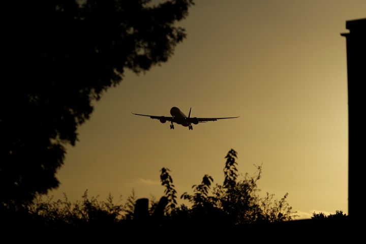 A plane comes in to land at Heathrow Airport in London