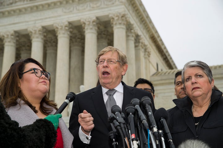 Former U.S. Solicitor General Ted Olson speaks, with DACA recipient Greisa Martinez Rosa, left, and former Secretary of Homeland Security Janet Napolitano right, after leaving the Supreme Court after oral arguments were heard in the case of President Trump's decision to end the Obama-era, Deferred Action for Childhood Arrivals program (DACA), Tuesday, Nov. 12, 2019, at the Supreme Court in Washington. (AP Photo/Alex Brandon)