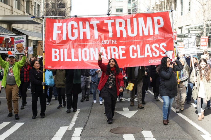 Seattle City Councilmember Kshama Sawant leads a march in support of a detained undocumented immigrant in 2017. Sawant, a socialist, was reelected Tuesday.