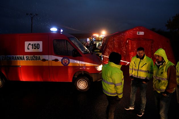 Rescue workers are seen at the site of a bus crash near the city of Nitra, Slovakia, November 13, 2019. REUTERS/Radovan Stoklasa