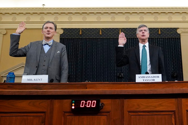 State Department official George Kent (left) and top U.S. diplomat in Ukraine William Taylor are sworn in prior to testifying before the House Intelligence Committee on Nov. 13, 2019.