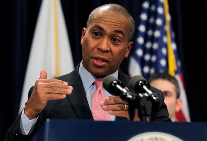 Mass. Gov. Deval Patrick gestures during a news conference at the State House in Boston in a Jan. 22, 2014, file photo.