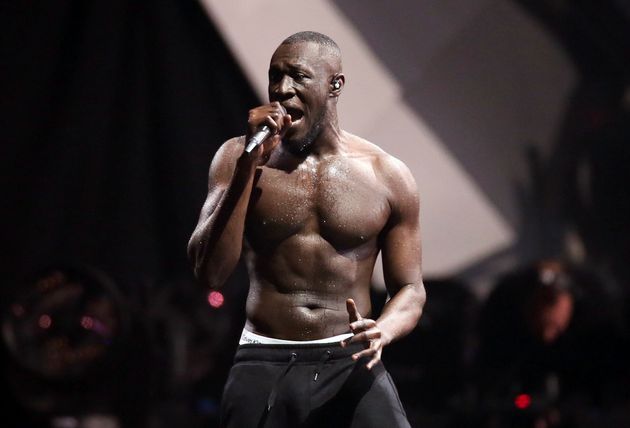 British grime artist Stormzy performs at the Brit Awards 2018 in London. 