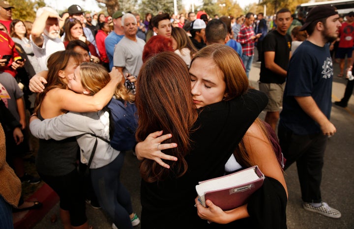 Saugus High School students are re-united with their parents at a nearby park after at least six people were wounded in a shooting at Saugus High School when a gunman opened fire on the Santa Clarita campus early Thursday.