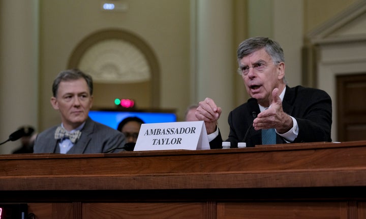 Ambassador William Taylor, right, speaks, along with George Kent, deputy assistant secretary of state for European and Eurasian affairs, during an impeachment inquiry in Washington, D.C., on Nov. 13, 2019.