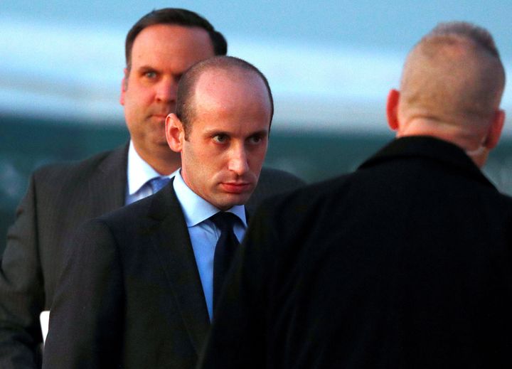 White House senior policy adviser Stephen Miller and White House director of social media Dan Scavino board Air Force One to depart Washington with U.S. President Donald Trump on Nov. 14, 2019. 