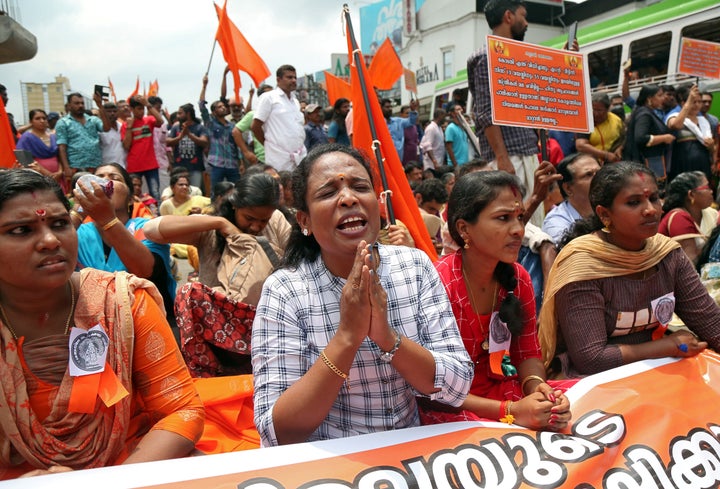 A woman chants hymns during a protest called by various Hindu organisations against the lifting of ban by Supreme Court that allowed entry of women of menstruating age to the Sabarimala temple, in Kochi, India, October 2, 2018. REUTERS/Sivaram V