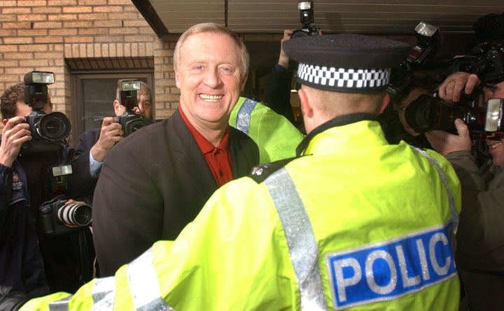 Chris Tarrant arrives at Southwark Crown Court in 2003