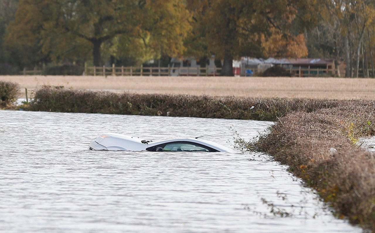 A car submerged on a route into Fishlake, north of Doncaster, on Monday.