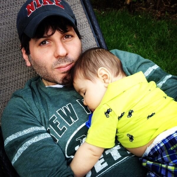 A photo from Adam's dating profile, which includes his son.