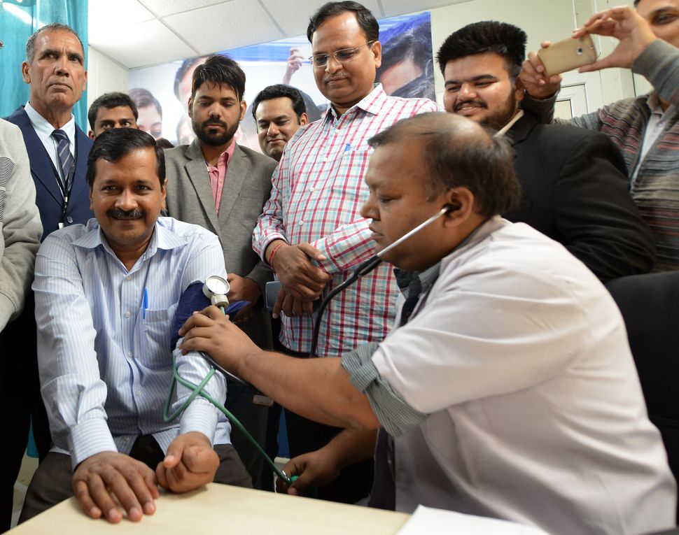Delhi CM Arvind Kejriwal and minister Satyendar Jain inaugurate a mohalla clinic at Sarai Kale Khan in New Delhi.