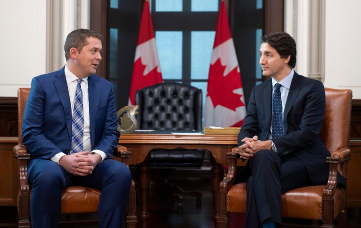 Prime Minister Justin Trudeau meets with Conservative leader Andrew Scheer in his office on Parliament Hill in Ottawa on Tuesday.