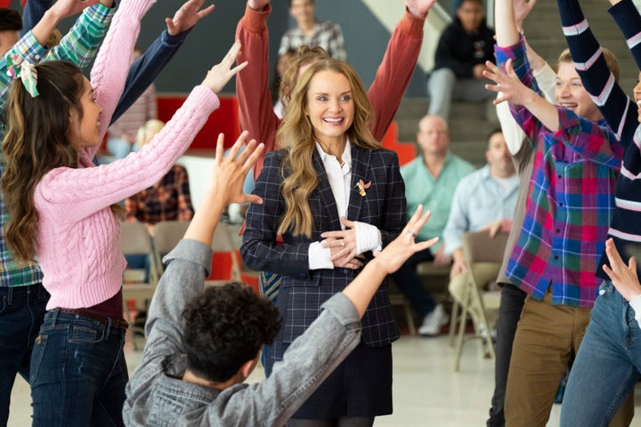 "I think what she’s realizing when she takes on this job is that there is a maternal side to her she didn’t realize was there," Kate Reinders (center) said of Miss Jenn, her character in "High School Musical: The Musical: The Series." 