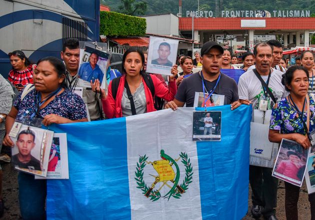 Members of the XV Caravan of Central American Mothers looking for missing migrant children are pictured upon arrival in Talisman, Chiapas state, Mexico border with Guatemala on November 15, 2019. (Photo by ISAAC GUZMAN / AFP) (Photo by ISAAC GUZMAN/AFP via Getty Images)