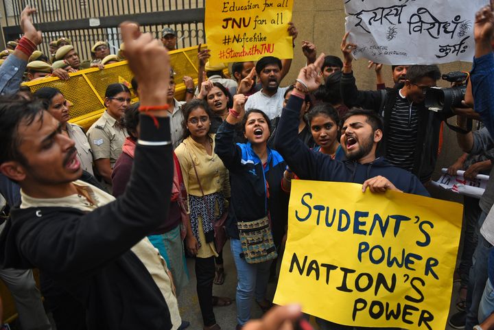ABVP Students from JNU hold placards and shout slogans during a protest against the Hostel fee hike, in front of the UGC Office, at ITO on November 13, 2019 in New Delhi, India.