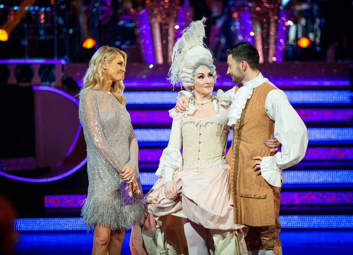 Michelle and Giovanni Pernice speak to Tess Daly after their elimination