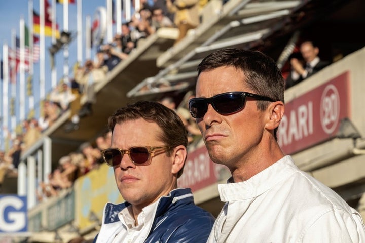 Christian Bale, right, and Matt Damon in a scene from the film, "Ford v. Ferrari." 
