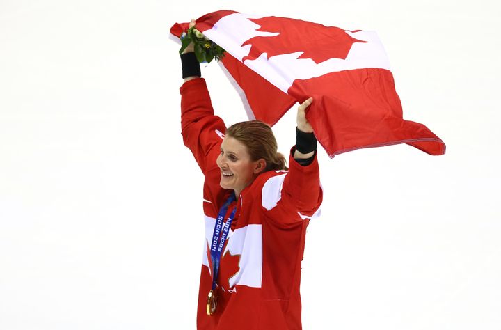 Hayley Wickenheiser celebrates after defeating the United States 3-2 in overtime on day 13 of the Sochi 2014 Winter Olympics on Feb. 20, 2014.