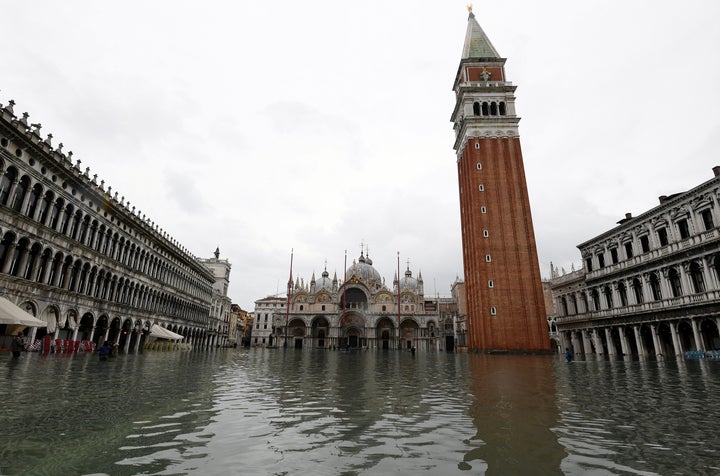 Water floods into St. Mark's square as high tide reaches peak, in Venice, Italy on Nov. 17, 2019. 