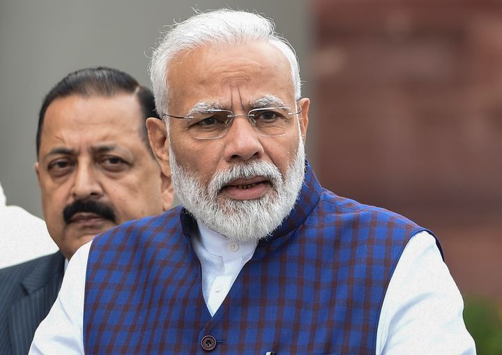 Indian Prime Minister Narendra Modi (C) stands with senior Bharatiya Janata Party (BJP) leaders as he addresses the media representatives after arriving for the winter session of parliament in New Delhi on November 18, 2019. (Photo by Money SHARMA / AFP) (Photo by MONEY SHARMA/AFP via Getty Images)