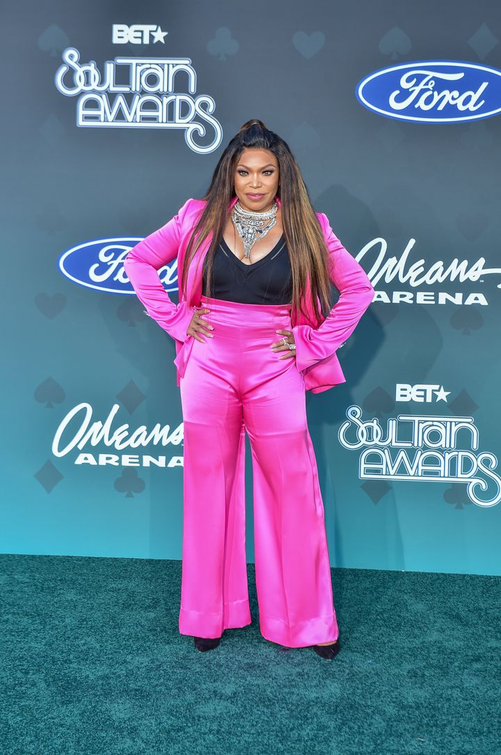 Tisha Campbell from "Martin" and "My Wife and Kids," who also hosted, looks in the pink.