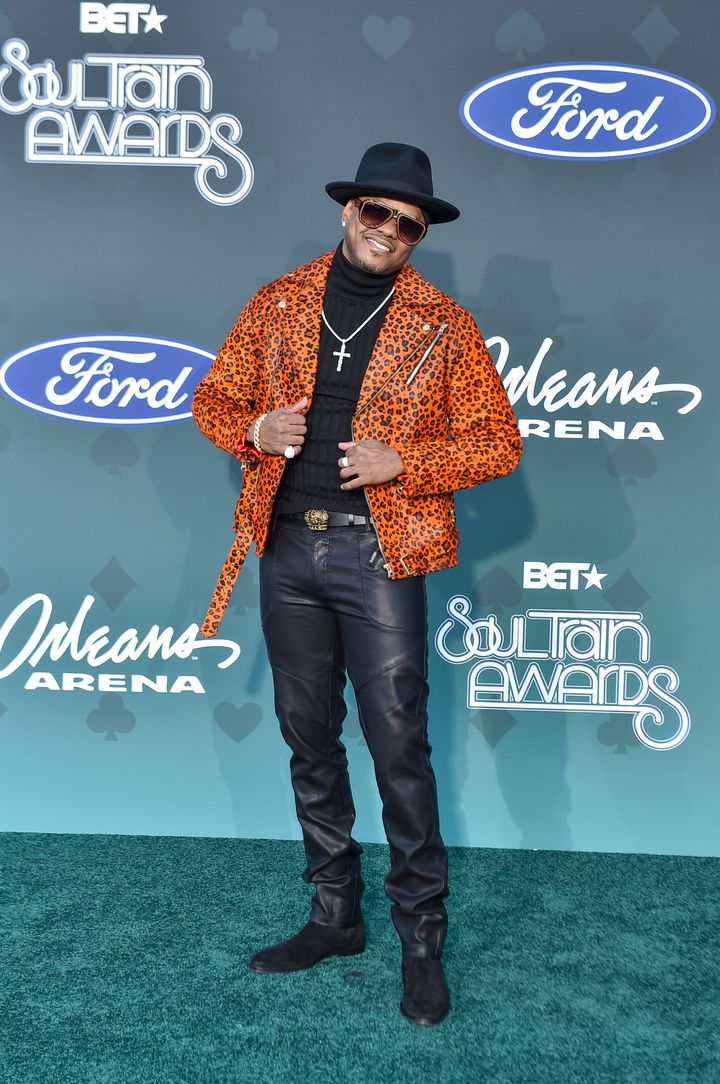"U Know What's Up" singer Donell Jones rides that orange wave in a nifty leather jacket paired with a black turtleneck and bl